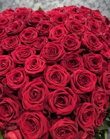A 100 Red Roses with love